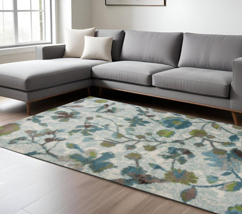 8' X 11' Teal Blue White And Green Floral Vines Area Rug