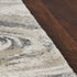 7' X 9' Gray And Tan Abstract Area Rug