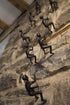 Set of Four Black Resin Climbing Man Hanging Dimensional Sculpture