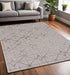 5' X 8' Ivory And Brown Geometric Area Rug