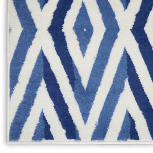 6' X 9' Ivory And Blue Geometric Area Rug