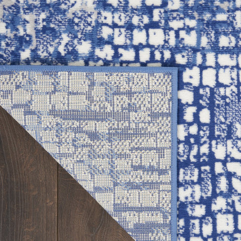 6' X 9' Ivory And Blue Geometric Area Rug