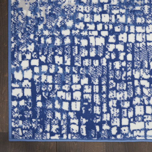 6' X 9' Ivory And Blue Geometric Area Rug