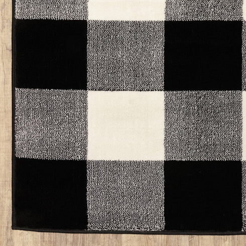7' X 9' Black And Ivory Gingham Area Rug