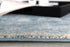 8' X 11' Cream And Blue Abstract Patches Area Rug