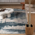 8' X 11' Cream And Blue Abstract Patches Area Rug