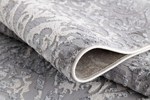 8' X 11' Cream And Gray Tinted Ogee Pattern Area Rug
