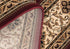 7' X 9' Red and Beige Floral Medallion Power Loom Area Rug