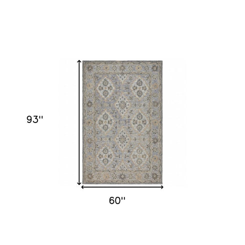 5' X 8' Blue and Tan Traditional Area Rug