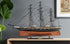 25" Brown And Black Solid Wood Hand Painted Boat