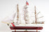 28" Maroon And White Solid Wood Hand Painted Boat