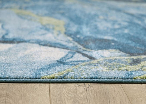 5' X 8' Teal Blue Green And Ivory Abstract Area Rug