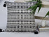 22" Black and White Southwestern Cotton Blend Throw Pillow With Tassels