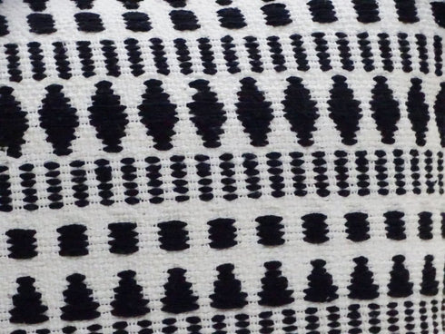 22" Black and White Southwestern Cotton Blend Throw Pillow With Tassels