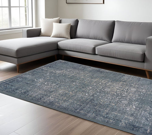 8' X 11' Blue Silver Gray And Cream Damask Distressed Stain Resistant Area Rug