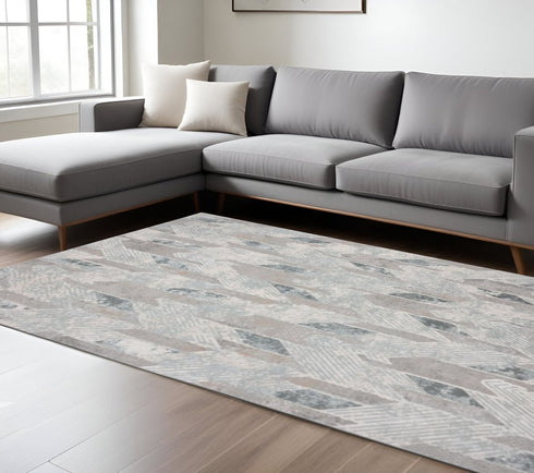 9' X 12' Gray Blue And Cream Geometric Distressed Stain Resistant Area Rug