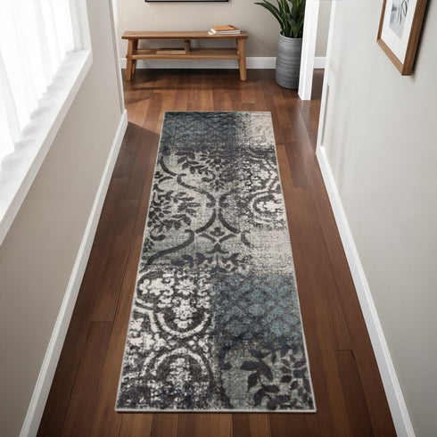 8' X 10' Teal And Ivory Damask Distressed Area Rug