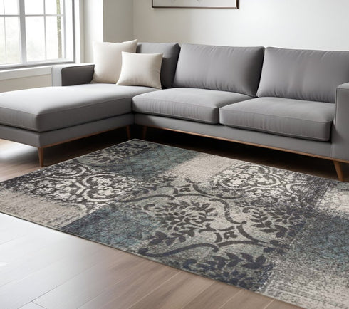 8' X 10' Teal And Ivory Damask Distressed Area Rug