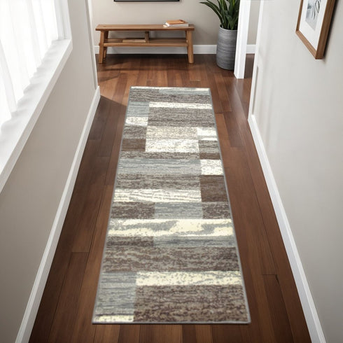 8' X 10' Blue And Ivory Patchwork Area Rug