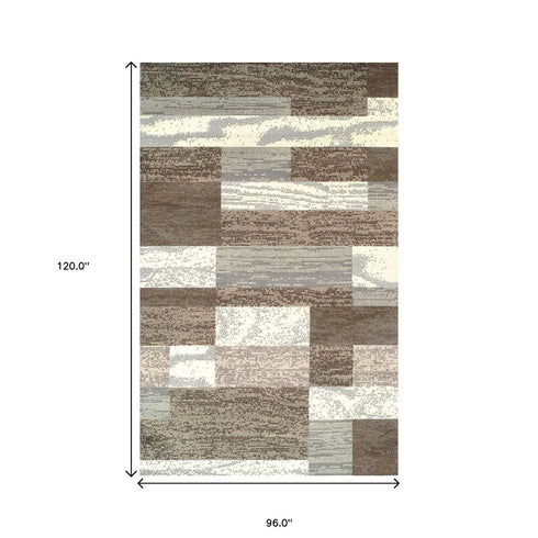 8' X 10' Blue And Ivory Patchwork Area Rug