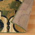 8' X 10' Green Brown And Ivory Quatrefoil Distressed Area Rug