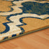 8' X 10' Green Brown And Ivory Quatrefoil Distressed Area Rug