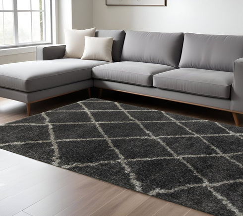 8' X 11' Charcoal And Grey Geometric Shag Power Loom Stain Resistant Area Rug