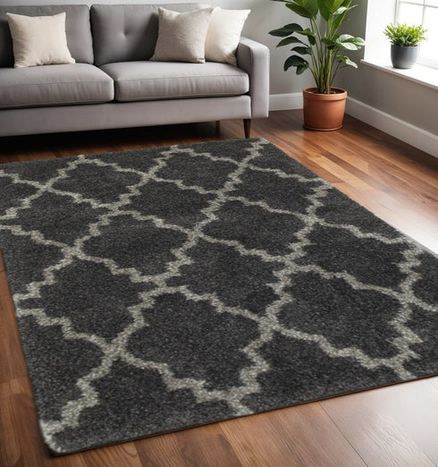 8' X 11' Charcoal And Grey Geometric Shag Power Loom Stain Resistant Area Rug