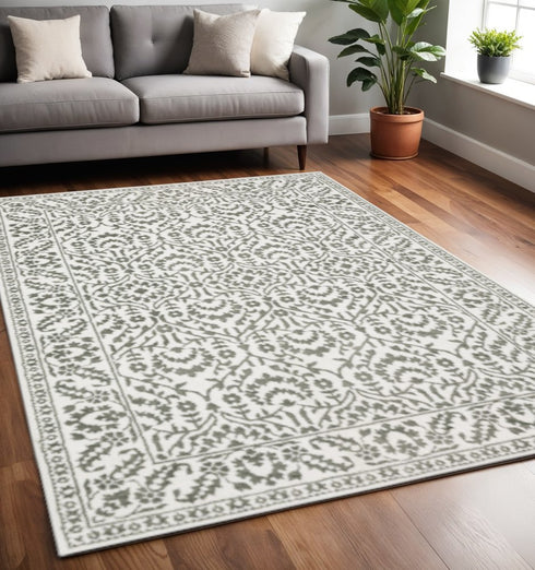8' X 11' Gray And White Floral Distressed Area Rug