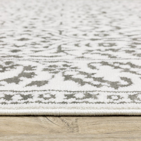 8' X 11' Gray And White Floral Distressed Area Rug