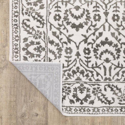 8' X 11' Gray And White Floral Distressed Area Rug