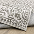 8' X 11' Gray And White Floral Distressed Area Rug