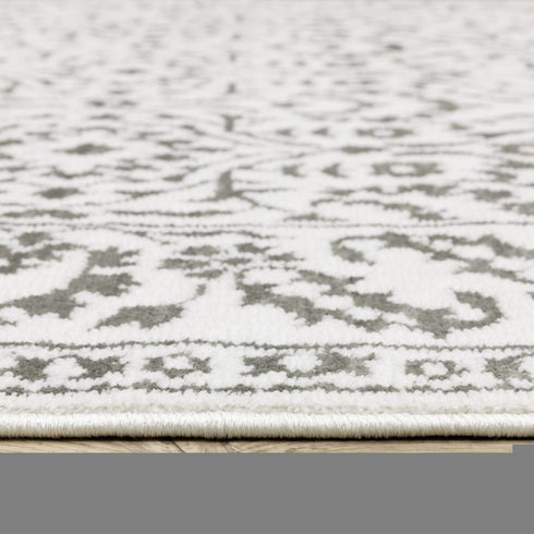 8' X 11' Gray And White Floral Distressed Area Rug