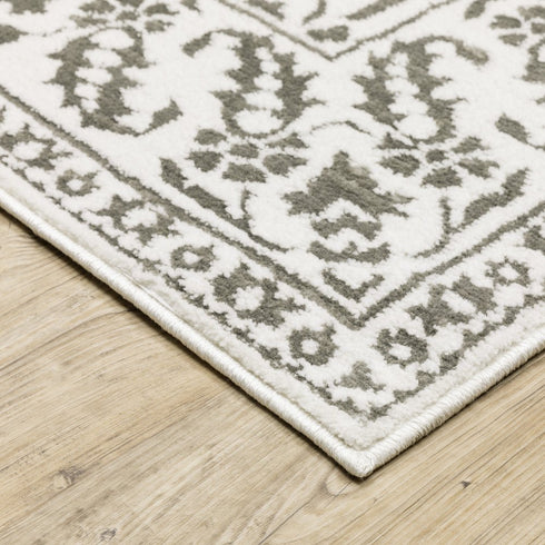 8' X 11' Gray And White Floral Distressed Area Rug