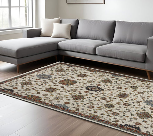8' X 11' Ivory Red And Yellow Oriental Area Rug With Fringe