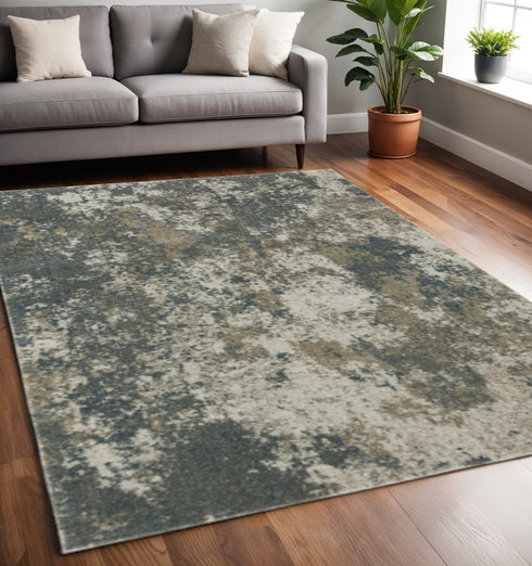 8' X 11' Tan and Gray Abstract Power Loom Area Rug