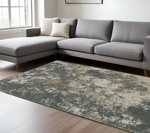 8' X 11' Tan and Gray Abstract Power Loom Area Rug