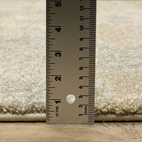 8' X 11' Grey Ivory Beige And Taupe Abstract Power Loom Stain Resistant Area Rug