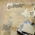 8' X 11' Beige Grey And Gold Abstract Power Loom Stain Resistant Area Rug