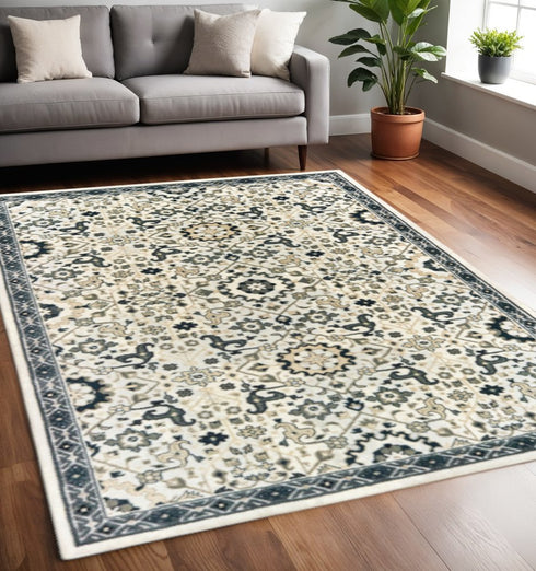8' X 11' Ivory And Navy Blue Oriental Area Rug