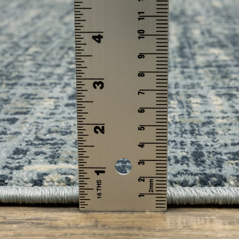 7' X 9' Blue And Beige Abstract Area Rug