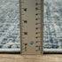 7' X 9' Blue And Beige Abstract Area Rug