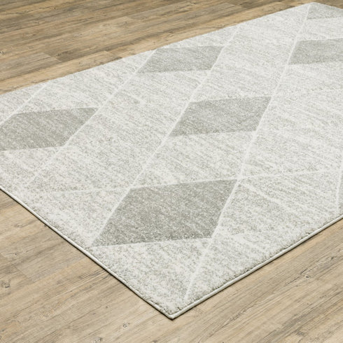 8' X 11' Gray And Ivory Geometric Area Rug