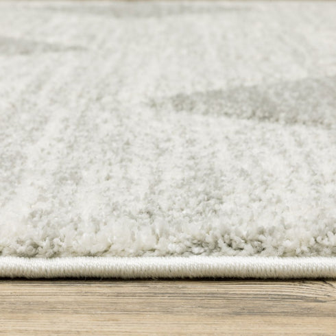 8' X 11' Gray And Ivory Geometric Area Rug