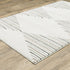 8' X 11' Beige Black And Green Geometric Area Rug