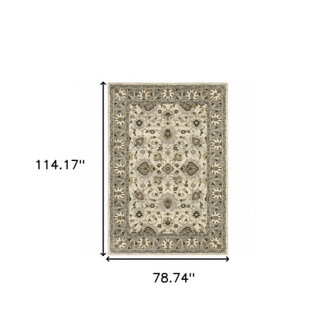 8' X 11' Beige Grey Brown And Charcoal Oriental Power Loom Stain Resistant Area Rug