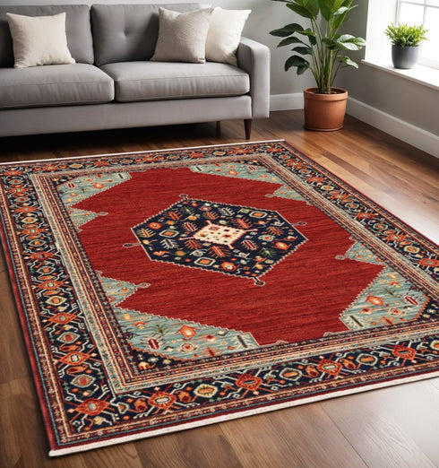 8' X 11' Red Blue Orange And Ivory Oriental Power Loom Stain Resistant Area Rug With Fringe