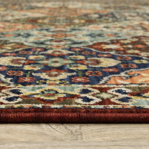 8' X 11' Red Rust Navy Light Blue Brown Orange Ivory And Gold Oriental Power Loom Stain Resistant Area Rug With Fringe