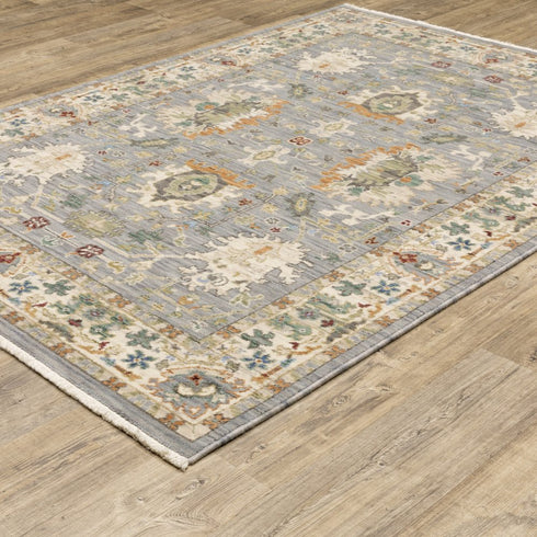 8' X 11' Grey Ivory Orange Teal Green Charcoal Blue And Red Oriental Power Loom Stain Resistant Area Rug With Fringe