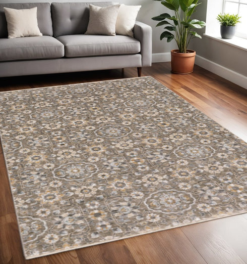 8' X 11' Gray Floral Power Loom Area Rug With Fringe